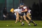 14 February 2024; Adam English of University of Limerick in action against Kieran Hanrahan of University of Galway during the Electric Ireland Higher Education GAA Fitzgibbon Cup semi final match between University of Galway and University of Limerick at St Joseph's Doora-Barefield GAA Club in Ennis, Clare. Photo by John Sheridan/Sportsfile