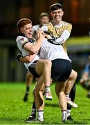 14 February 2024; Ulster University players, from left, Conor Murphy, Ryan Magill and Oisin Treacy celebrate victory after the Electric Ireland Higher Education GAA Sigerson Cup final match between UCD and Ulster University at Austin Stack Park in Tralee, Kerry. Photo by Brendan Moran/Sportsfile