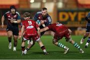 16 February 2024; RG Snyman of Munster is tackled by Alex Craig of Scarlets during the United Rugby Championship match between Scarlets and Munster at Parc y Scarlets in Llanelli, Wales. Photo by Chris Fairweather/Sportsfile