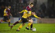 16 February 2024; Kian Leavy of St Patrick's Athletic in action against David Hurley of Galway United during the SSE Airtricity Men's Premier Division match between Galway United and St Patrick's Athletic at Eamonn Deacy Park in Galway. Photo by Seb Daly/Sportsfile