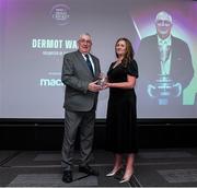 16 February 2024; Dermot Ward fron Ardmore Cricket Club is presented with the award for Volunteer of the Year by Elaine Nolan from Macron during the 12th Business Plus Irish Cricket Awards 2024 at Clontarf Castle Hotel in Dublin. Photo by Matt Browne/Sportsfile