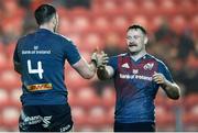 16 February 2024; Tom Ahern of Munster celebrates with team-mate Sean O’Brien after scoring a try during the United Rugby Championship match between Scarlets and Munster at Parc y Scarlets in Llanelli, Wales. Photo by Gruffydd Thomas/Sportsfile