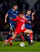 24 February 2024; Connor Malley of Sligo Rovers is tackled by Cameron Dummigan of Derry City during the SSE Airtricity Men's Premier Division match between Sligo Rovers and Derry City at The Showgrounds in Sligo. Photo by Tyler Miller/Sportsfile