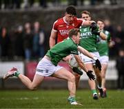 25 February 2024; Colm O'Callaghan of Cork is blocked by Josh Largo Elis of Fermanaghduring the Allianz Football League Division 2 match between Fermanagh and Cork at St Joseph’s Park in Ederney, Fermanagh. Photo by Ben McShane/Sportsfile