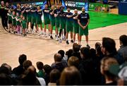 25 February 2024; The Ireland team and coaches during the national anthem before the FIBA Basketball World Cup 2027 European Pre-Qualifiers first round match between Ireland and Switzerland at the National Basketball Arena in Tallaght, Dublin. Photo by David Fitzgerald/Sportsfile