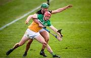 25 February 2024; Charlie Mitchell of Offaly is tackled by Tommy Walsh of Kilkenny during the Allianz Hurling League Division 1 Group A match between Kilkenny and Offaly at UPMC Nowlan Park in Kilkenny. Photo by Ray McManus/Sportsfile