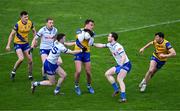 25 February 2024; Enda Smith of Roscommon in action against Michael McCarville, left, and Killian Lavelle of Monaghan during the Allianz Football League Division 1 match between Roscommon and Monaghan at Dr Hyde Park in Roscommon. Photo by Daire Brennan/Sportsfile