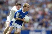 18 July 2004; Donal Brennan, Laois, in action against Ian Lonergan, Kildare. Leinster Minor Football Championship Final, Laois v Kildare, Croke Park, Dublin. Picture credit; Ray McManus / SPORTSFILE