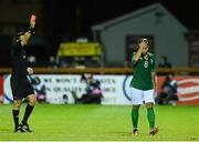 9 September 2013; Republic of Ireland's Samir Carruthers is shown a red card by referee Domagoj Vuckov. UEFA U21 Championships Qualifying Round, Group 6, Republic of Ireland v Germany, The Showgrounds, Sligo. Photo by Sportsfile