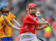 8 September 2013; Louise O'Callaghan, from Flagmount/Dromindoora N.S. Feakle, Co. Clare, representing Cork, in action against Eimear Duffy, from Scoil na gCailíní, Castleblayney, Co. Monaghan, representing Clare. INTO/RESPECT Exhibition GoGames during the GAA Hurling All-Ireland Senior Championship Final between Cork and Clare, Croke Park, Dublin. Photo by Sportsfile