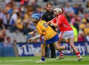 8 September 2013; Eimear Duffy, from Scoil na gCailíní, Castleblayney, Co. Monaghan, representing Clare, in action against Katie Condon, from Upperchurch N.S. Thurles, Co. Tipperary, representing Cork. INTO/RESPECT Exhibition GoGames during the GAA Hurling All-Ireland Senior Championship Final between Cork and Clare, Croke Park, Dublin. Photo by Sportsfile