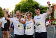 10 September 2013; James Cottle, left, Rachel McGrain and Oliver Clare, Airbus, before the Grant Thornton 5k Corporate Team Challenge 2013. Dublin Docklands, Dublin. Photo by Sportsfile
