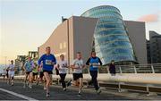 10 September 2013; A general view of competitors making their way over Samuel Beckett Bridge during the Grant Thornton 5k Corporate Team Challenge 2013. Dublin Docklands, Dublin. Photo by Sportsfile