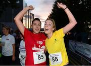 10 September 2013; Sisters Debbie, left, and Karen Hilliard, from Knocklyon, Co. Dublin, after competing in the Grant Thornton 5k Corporate Team Challenge 2013. Dublin Docklands, Dublin. Photo by Sportsfile