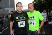 10 September 2013; Brian O'Neill, left, and Peter Dolan, running for Woodies DIY, in the Grant Thornton 5k Corporate Team Challenge 2013. Dublin Docklands, Dublin. Photo by Sportsfile