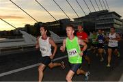 10 September 2013; Conor Dooney, left, Davy Stockbrokers, and Dermot McDermott, Team Dovas competing in the Grant Thornton 5k Corporate Team Challenge 2013. Dublin Docklands, Dublin. Photo by Sportsfile