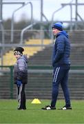 25 February 2024; Monaghan manager Vinny Corey with his son Páidí, aged 5, ahead of the Allianz Football League Division 1 match between Roscommon and Monaghan at Dr Hyde Park in Roscommon. Photo by Daire Brennan/Sportsfile