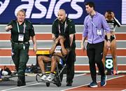 2 March 2024; Aleia Hobbs of USA is brought from the track after suffering an injury before the Women's 60m Final on day two of the World Indoor Athletics Championships 2024 at Emirates Arena in Glasgow, Scotland. Photo by Sam Barnes/Sportsfile