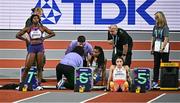 2 March 2024; Aleia Hobbs of USA receives medical treatment for an injury before the Women's 60m Final day two of the World Indoor Athletics Championships 2024 at Emirates Arena in Glasgow, Scotland. Photo by Sam Barnes/Sportsfile