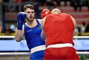 6 March 2024; Martin McDonagh of Ireland, left, in action against Yusuf Acik of Türkiye during their Men's 92kg+ Round of 32 bout during day four at the Paris 2024 Olympic Boxing Qualification Tournament at E-Work Arena in Busto Arsizio, Italy. Photo by Ben McShane/Sportsfile