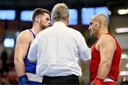 6 March 2024; Yusuf Acik of Türkiye, right, and Martin McDonagh of Ireland face-off before their Men's 92kg+ Round of 32 bout during day four at the Paris 2024 Olympic Boxing Qualification Tournament at E-Work Arena in Busto Arsizio, Italy. Photo by Ben McShane/Sportsfile
