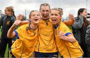7 March 2024; DCU Dochas Eireann players, from left, Emer Quinn, Emma Shannon, and Síofra Galvin after their side's victory the 2024 Ladies HEC Cup final match between DCU Dochas Eireann and Mary Immaculate College at MTU Cork. Photo by Stephen Marken/Sportsfile