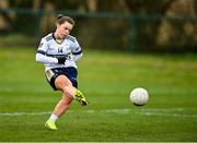 7 March 2024; Caitlín Ní Cheallaigh of Ulster University shoots to score her side's first goal, a penalty, during the 2024 Ladies HEC Lagan Cup final match between DCU Dochas Eireann and Ulster University, Belfast at MTU Cork. Photo by Stephen Marken/Sportsfile