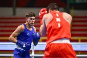 7 March 2024; Patris Mughalzai of Great Britain during their Men's 63.5kg Round of 32 bout against Ali Habibinezhad of Iran during day five at the Paris 2024 Olympic Boxing Qualification Tournament at E-Work Arena in Busto Arsizio, Italy. Photo by Ben McShane/Sportsfile
