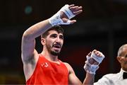 7 March 2024; Ali Habibinezhad of Iran celebrates victory in their Men's 63.5kg Round of 32 bout against Patris Mughalzai of Great Britain during day five at the Paris 2024 Olympic Boxing Qualification Tournament at E-Work Arena in Busto Arsizio, Italy. Photo by Ben McShane/Sportsfile