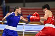 7 March 2024; Emilio Garcia of USA, right, in action against Erislandy Alvarez of Cuba during their Men's 63.5kg Round of 32 bout during day five at the Paris 2024 Olympic Boxing Qualification Tournament at E-Work Arena in Busto Arsizio, Italy. Photo by Ben McShane/Sportsfile