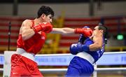 7 March 2024; Emilio Garcia of USA, left, in action against Erislandy Alvarez of Cuba during their Men's 63.5kg Round of 32 bout during day five at the Paris 2024 Olympic Boxing Qualification Tournament at E-Work Arena in Busto Arsizio, Italy. Photo by Ben McShane/Sportsfile