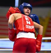 8 March 2024; Daina Moorehouse of Ireland, right, in action against Tayonis Cedeno of Venezuela during their Women's 50kg Round of 32 bout against during day six at the Paris 2024 Olympic Boxing Qualification Tournament at E-Work Arena in Busto Arsizio, Italy. Photo by Ben McShane/Sportsfile