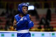 8 March 2024; Janet Acquah of Ghana during their Women's 50kg Round of 32 bout against Yi-Xuan Guo of Chinese Taipei during day six at the Paris 2024 Olympic Boxing Qualification Tournament at E-Work Arena in Busto Arsizio, Italy. Photo by Ben McShane/Sportsfile