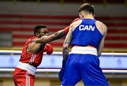 8 March 2024; Pedro Manuel Gomes of Angola, left, in action against Victor Tremblay of Canada during their Men's 57kg Round of 32 bout during day six at the Paris 2024 Olympic Boxing Qualification Tournament at E-Work Arena in Busto Arsizio, Italy. Photo by Ben McShane/Sportsfile