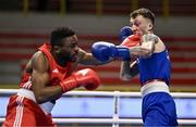 8 March 2024; Pedro Manuel Gomes of Angola, left, in action against Victor Tremblay of Canada during their Men's 57kg Round of 32 bout during day six at the Paris 2024 Olympic Boxing Qualification Tournament at E-Work Arena in Busto Arsizio, Italy. Photo by Ben McShane/Sportsfile