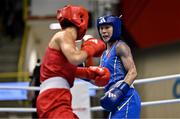 8 March 2024; Elise Glynn of Great Britain, left, in action against Zichun Xu of China during their Women's 57kg Round of 32 bout during day six at the Paris 2024 Olympic Boxing Qualification Tournament at E-Work Arena in Busto Arsizio, Italy. Photo by Ben McShane/Sportsfile