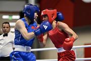 8 March 2024; Elise Glynn of Great Britain, right, in action against Zichun Xu of China during their Women's 57kg Round of 32 bout during day six at the Paris 2024 Olympic Boxing Qualification Tournament at E-Work Arena in Busto Arsizio, Italy. Photo by Ben McShane/Sportsfile