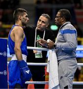 8 March 2024; Daniyal Shahbakhsh of Iran with Iran coaches Homayon Omiri, centre, and Juan Bautista Fontanills Quaseda during their Men's 57kg Round of 32 bout against Shakur Ovezov of Turkmenistan during day six at the Paris 2024 Olympic Boxing Qualification Tournament at E-Work Arena in Busto Arsizio, Italy. Photo by Ben McShane/Sportsfile