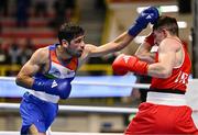 8 March 2024; Jude Gallagher of Ireland, right, in action against Uddin Mohammed Hussam of India during their Men's 57kg Round of 32 bout during day six at the Paris 2024 Olympic Boxing Qualification Tournament at E-Work Arena in Busto Arsizio, Italy. Photo by Ben McShane/Sportsfile