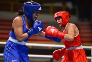 9 March 2024; Sofia Micaela Robles of Argentina, right, in action against Shera Mae Patricio of USA during their Women's 54kg Round of 16 bout during day seven at the Paris 2024 Olympic Boxing Qualification Tournament at E-Work Arena in Busto Arsizio, Italy. Photo by Ben McShane/Sportsfile