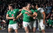 9 March 2024; James Lowe of Ireland celebrates after scoring his side's second try, in 73rd minute, with teammates Jack Crowley and Conor Murray during the Guinness Six Nations Rugby Championship match between England and Ireland at Twickenham Stadium in London, England. Photo by David Fitzgerald/Sportsfile