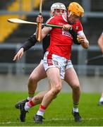 10 March 2024; Shane Barrett of Cork is tackled by Offaly goalkeeper Mark Troy during the Allianz Hurling League Division 1 Group A match between Offaly and Cork at Glenisk O'Connor Park in Tullamore, Offaly. Photo by Tyler Miller/Sportsfile