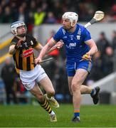 10 March 2024; Conor Cleary of Clare is tackled by TJ Reid of Kilkenny during the Allianz Hurling League Division 1 Group A match between Clare and Kilkenny at Cusack Park in Ennis, Clare. Photo by Ray McManus/Sportsfile