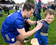 10 March 2024; Darragh Lohan of Clare signs the shirt of ten year old Darragh Jim Mescal, from West Clare, after the Allianz Hurling League Division 1 Group A match between Clare and Kilkenny at Cusack Park in Ennis, Clare. Photo by Ray McManus/Sportsfile