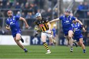 10 March 2024; TJ Reid of Kilkenny in action against Peter Duggan, left, and David Fitzgerald of Clare during the Allianz Hurling League Division 1 Group A match between Clare and Kilkenny at Cusack Park in Ennis, Clare. Photo by John Sheridan/Sportsfile