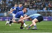 13 March 2024; Eoghan Brady of St Mary’s College is tackled by Oliver Healy of St Michael’s College during the Bank of Ireland Schools Junior Cup semi-final match between St Michael's College and St Mary's College at Energia Park in Dublin. Photo by Daire Brennan/Sportsfile