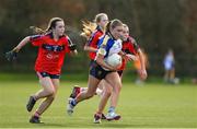 15 March 2024; Elannah Keane of Ballinrobe Community School in action against Siun Cronin and Ruby Prendeville of St Marys during the Lidl All-Ireland Post Primary School Junior C Championship final match between St Marys, Macroom, Cork and Ballinrobe Community School, Mayo at the University of Limerick. Photo by Matt Browne/Sportsfile