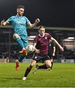15 March 2024; Dylan Watts of Shamrock Rovers in action against David Hurley of Galway United during the SSE Airtricity Men's Premier Division match between Galway United and Shamrock Rovers at Eamonn Deacy Park in Galway. Photo by Piaras Ó Mídheach/Sportsfile