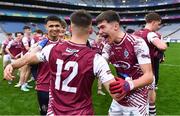 16 March 2024; Omagh CBS players Mark Corcoran, right, and Jack Law, 12, celebrate after their side's victory in the Masita GAA Football Post Primary Schools Hogan Cup final match between Mercy Mounthawk of Kerry and Omagh CBS of Tyrone at Croke Park in Dublin. Photo by Piaras Ó Mídheach/Sportsfile