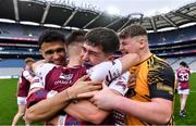 16 March 2024; Mark Corcoran of Omagh CBS, centre, celebrates with team-mates after their side's victory in the Masita GAA Football Post Primary Schools Hogan Cup final match between Mercy Mounthawk of Kerry and Omagh CBS of Tyrone at Croke Park in Dublin. Photo by Piaras Ó Mídheach/Sportsfile